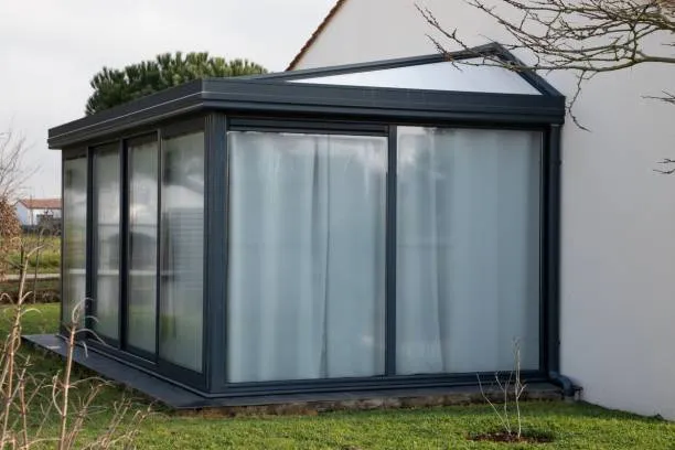 véranda menuiseries aluminium travaux extension confort thermique