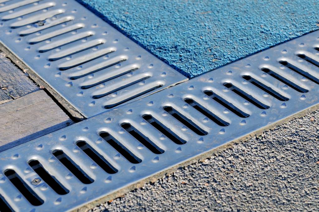 système drainage eaux pluviales eau pluie parking ouvert plein air sol surface
